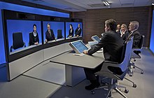 Telepresence utilized in a professional setting for meetings Tandberg Image Gallery - telepresence-t3-side-view-hires.jpg