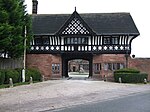 Gatehouse to Thornton Manor and Attached Courtyard Walls