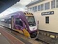 VLocity set VL60 sits at Platform 2 next to Signal Box A, September 2022