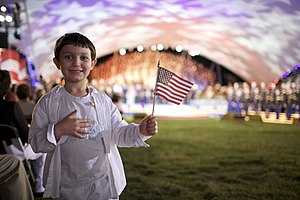 A young patriot salutes heroes at the 2009 Nat...