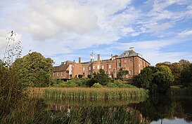 The rear of the house and the moat Hartlebury Castle viewed across moat.JPG