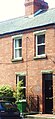 House featuring original sash windows and granite lintels