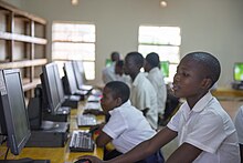 Students at Nyungwe Community Day Secondary School enjoying their new computer lab.