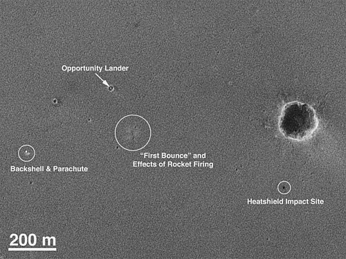 Mars Global Surveyor orbiter's photograph of landing site showing "hole in one." (See also: simulation of Opportunity's trajectory on arrival at Mars in January 2004). PIA05229 label.jpg
