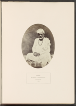 Arora in Lahore (c. 1862-72). Portrait of an unidentified Arora Storekeeper from Lahore with coins in hand and in front of him, ca.1862-72.png