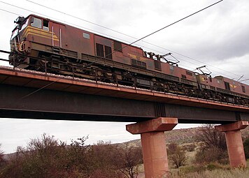No. E9006 in SAR Gulf Red livery near Dingleton, Northern Cape, 14 May 2006