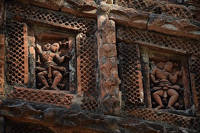 A terracotta relief on a temple at Dignagar.