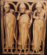 Normandos con umbos sobre sus escudos. Temple Pyx (Monstranz), Teil eines Reliquiars (datado entre 1140-1150), en la Burrell Collection, Glasgow.