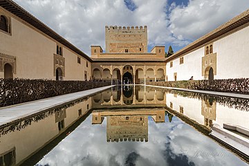 The reflecting pool in the Patio de los Arrayanes, at the Moorish Alhambra of Granada, Spain