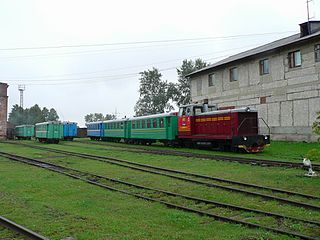 TU7–2386 with passenger train