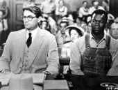 Scene from the 1962 film To Kill a Mockingbird. American cinema was one of the most influential artforms of the post-war period. Atticus and Tom Robinson in court.gif