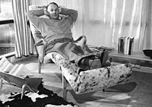 Bruno Mathsson leaning back in an armchair