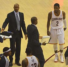 Byron Scott (left) coaching the Cavaliers in 2013 Byron Scott Kyrie Irving.jpg