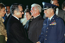 Mohammed Reza Pahlavi, Shah of Iran, shakes hands with a US Air Force general officer prior to his departure from the United States DF-SC-86-12761.jpg