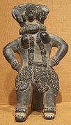 Figura femenina de terracota (320-200 a.C.), proveniente del norte de la India. Museo de Arte de Honolulu.