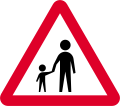 Pedestrian on or crossing road ahead