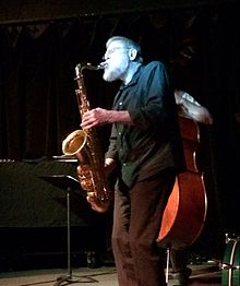 Lew Tabackin playing tenor saxophone at the Artists' Quarter jazz club on November 16, 2013.jpg