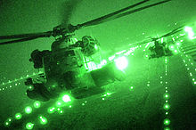 MH-53 Pave Lows fly over Iraq on their last combat missions in September 2008, before their retirement. MH53 night.jpg