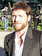 A photograph of Sam Worthington