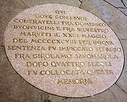 A plaque commemorates the site of Savonarola’s execution in the Piazza della Signoria, Florence.