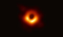 A blurry photo of a supermassive black hole in M87.