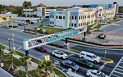 Photo of Main Street & US-19 showcasing the Historic Downtown New Port Richey sign.