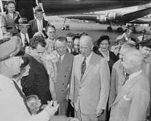 Julie Nixon, then aged 4, with Republican 1952 presidential nominee Dwight D. Eisenhower at Washington National Airport as she is held by her father, Eisenhower's vice presidential running mate, in September 1952, two months before the 1952 presidential election Eisenhower meets the Nixons.gif