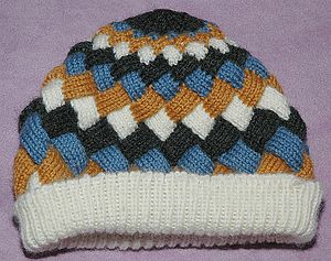Hat knit using entrelac, in four colors