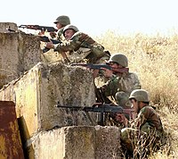 Грузинські стрільці та кулеметники під час навчальних стрільб. 2006