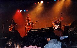 Outpatients performing at Halley in Buenos Aires, Argentina 1992. Left to right: Marc Lichtenstein, Vis Helland, and Scott Helland