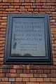 Tablica wmurowana w ścianę Cytadeli Warszawskiej tuż za szczątkami szubienicy, na której w okresie zaborów ginęli skazańcy. Upamiętnia członków rządu powstania styczniowego straconych 5 sierpnia 1864 r.