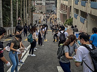 Protesters moving bricks