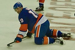 Alan Quine Islanders stretching.jpg