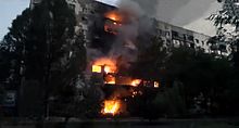 A burning block of flats in Shakhtarsk, 3 August 2014 Burning apartment building in Shahtersk, August 3, 2014.jpg