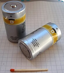 2 carbon-zinc D batteries, positive and negative terminals up and down. D matchstick-1.jpg