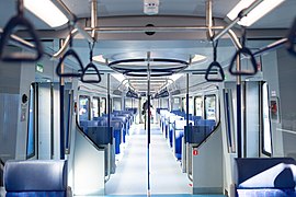 Passenger rows of seats inside intermediate car of Ivolga-1.0.