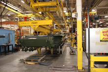 An M1 Abrams hull undergoing work on the suspension system at the Joint Systems Manufacturing Center in Lima in 2021 M1 Abrams hull at Joint Systems Manufacturing Center-Lima in 2021.webp