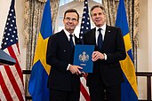 prime minister ulf kristersson (left) and secretary of state antony blinken at the ceremony