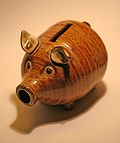 Sparebøsse udformet som en gris, også kaldet en sparegris