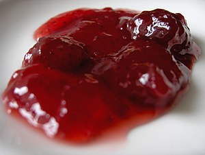 Strawberry jam on a plate.