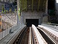 Vue du tunnel Viret du M2, à travers la culée ouest du pont Bessières