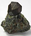 Image 16Black andradite, an end-member of the orthosilicate garnet group. (from Mineral)