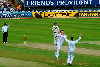 Broad celebrates the wicket of Michael Hussey with Graeme Swann in the 3rd Test of the 2009 Ashes Series. Broad celebrating, 2009.jpg