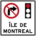 Panneau à l'île de Montréal interdisant de tourner à droite au feu rouge.