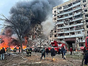 Aftermath of the Russian missile strike on an apartment block in Dnipro (14 January 2023), which killed 46 civilians Dnipro after Russian missile attack, 2023-01-14 (02-01).jpg