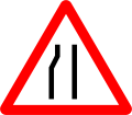 5b) — Road narrows on the left