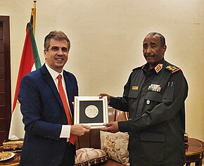 Sudanese leader Abdel Fattah al-Burhan with Israel's Minister of Intelligence, Eli Cohen, in January 2021 Minishter of Intelligence of Israel Eli Cohen and President of Sudan Abdel Fattah al-Burhan.jpg