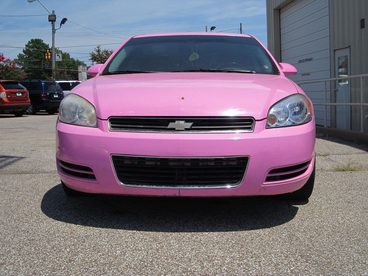 pictures of pink cars