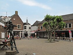 Renkum town streetview with chuch tower at the background