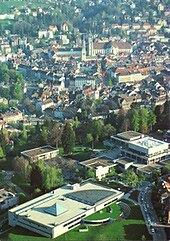 The University of St. Gallen with the Altstadt of St. Gallen and its Abbey of Saint Gall in the background St Gallen University.jpg